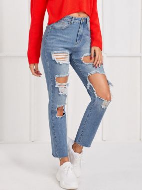 Рваные джинсы с необработанным низом