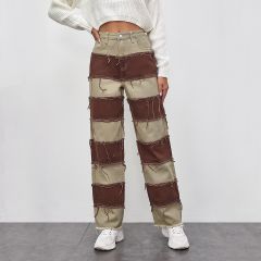 Двухцветные прямые джинсы с бахромой